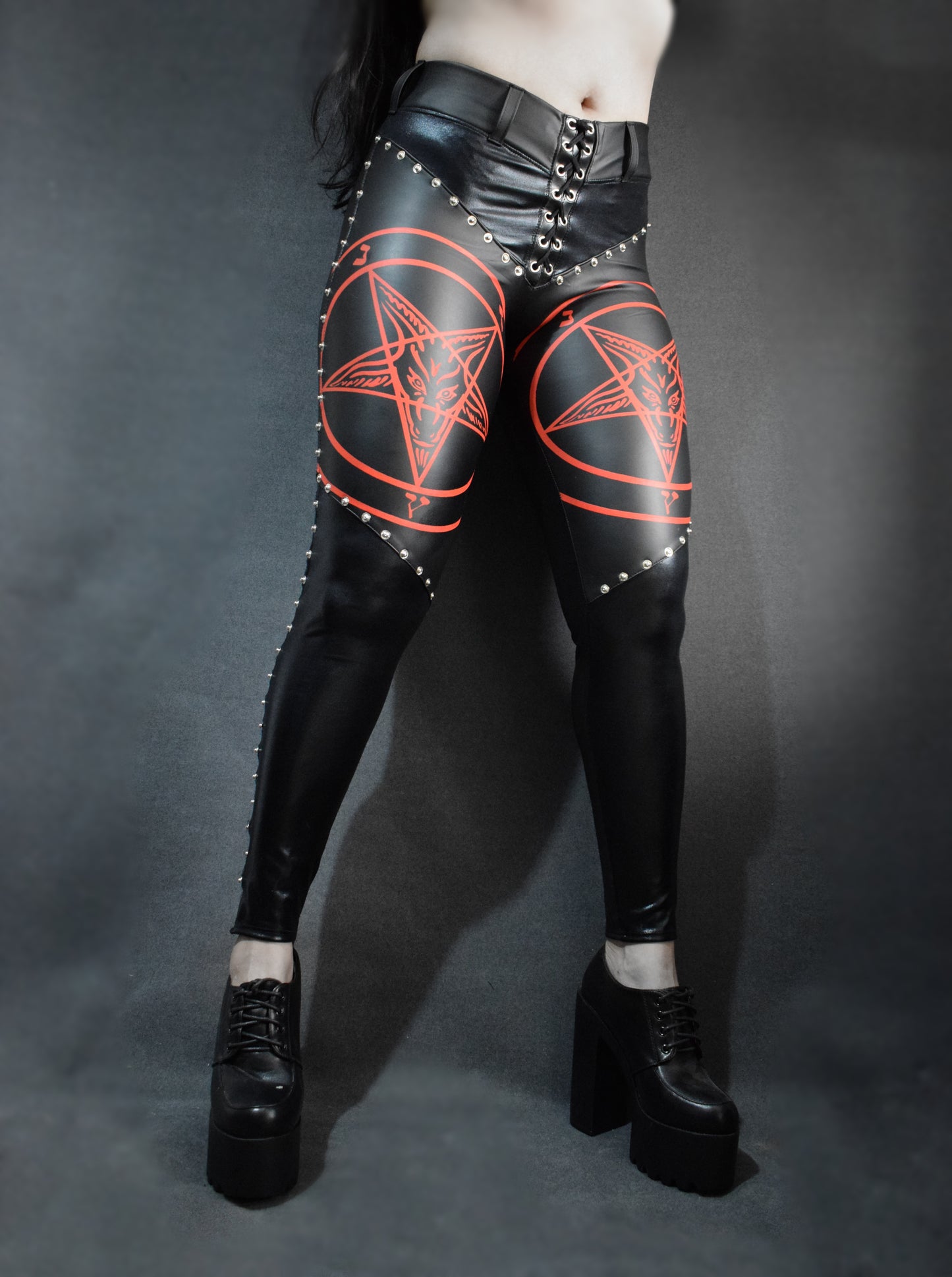 leggings with red pentagram adorned with studs
